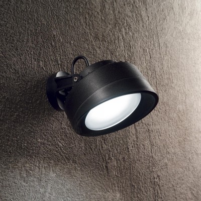 TOMMY Venkovní nástěnné svítidlo, nastavitelný směr svícení, těleso plast, povrch černá, difuzor plast opál, pro LED 1x10W, GX53, 230V, IP66, tř.2, rozměry d=150mm.